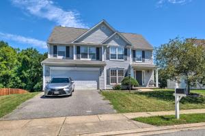 a car parked in front of a house at Cozy Waldorf Guest Suite Near Potomac River! in Waldorf