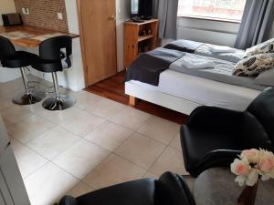 Postel nebo postele na pokoji v ubytování BSG Apartments