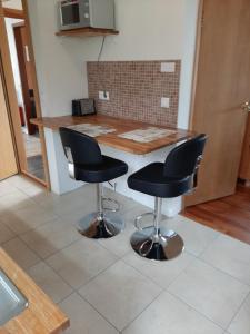Kuchyň nebo kuchyňský kout v ubytování BSG Apartments