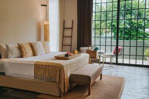 Кровать или кровати в номере Antelar Casa Destino