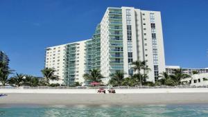 a large building on the beach in front of a building at THE TIDES 2bedrooms apt 14th floor WE ARE ON THE BEACH! in Hollywood +26 photos
