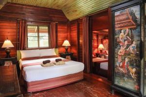 Ein Bett oder Betten in einem Zimmer der Unterkunft Leeloo Paradise