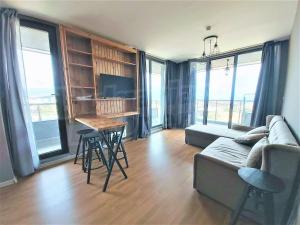 TV a/nebo společenská místnost v ubytování Private Apartment in Aparthotel Cornelia