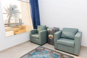 Posezení v ubytování استراحة نادي اورجان Orjan Guest House
