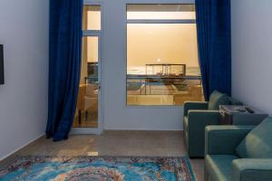 Posezení v ubytování استراحة نادي اورجان Orjan Guest House