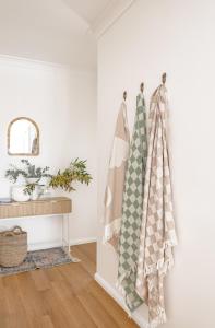 a room with two towels hanging on a wall at Casa Keys Shoal Bay in Shoal Bay