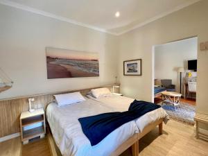 Ένα ή περισσότερα κρεβάτια σε δωμάτιο στο The Secret Garden Guesthouse +47 φωτογραφίες