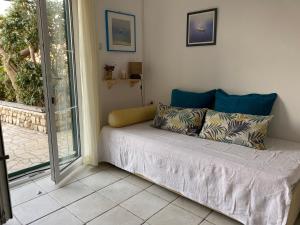 Postel nebo postele na pokoji v ubytování Apartment Lucia