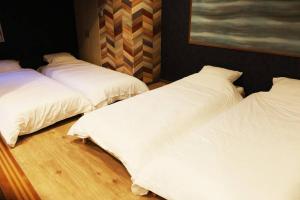 MolinHotels201温泉付き別荘 -アクティビティを満喫できる札幌定山渓-2LDK W-beds2&S-beds4客房内的一张或多张床位