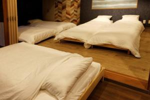 MolinHotels201温泉付き別荘 -アクティビティを満喫できる札幌定山渓-2LDK W-beds2&S-beds4客房内的一张或多张床位