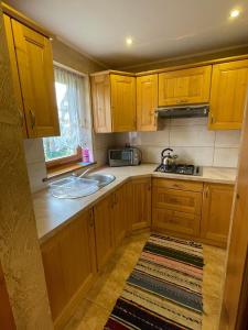 Dapur atau dapur kecil di Góralski Apartament