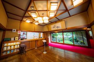 an overhead view of a room with a large window at Yunoshimakan in Gero