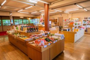 a grocery store with a lot of food on display at Yunoshimakan in Gero
