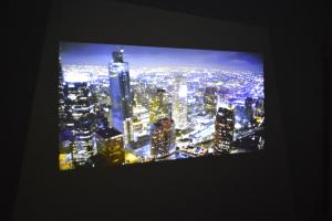 a television screen showing a city at night at OAK Yasaka / Vacation STAY 477 in Osaka