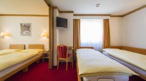 Voodi või voodid majutusasutuse Hotel Excelsior toas