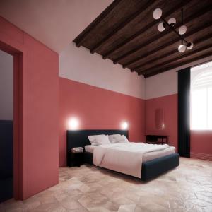 a bedroom with a large bed with red walls at Off in Rome