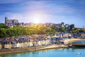 a view of a town with a river and houses at COTE CIEL - CANCALE - GITE STANDING - PROCHE CENTRE ET PORT in Cancale