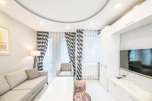 TV a/nebo společenská místnost v ubytování Taksim Devrim House