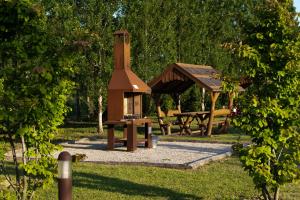Сад в Lino delle Fate Eco Resort