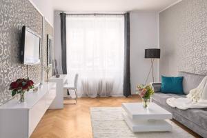 Posezení v ubytování Gentle and cozy apartment right at the Center Prague