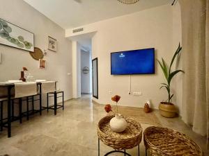 A television and/or entertainment centre at El descanso del almorávide