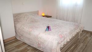 Postel nebo postele na pokoji v ubytování Apartment Lavanda with three bedrooms - TA Leut Agency