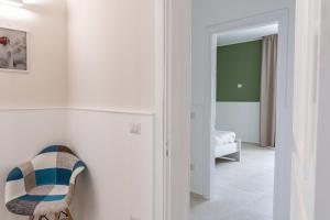A bed or beds in a room at Villa Sabbia Bianca By Cala Salento