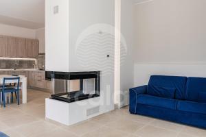 A kitchen or kitchenette at Villa Sabbia Bianca By Cala Salento