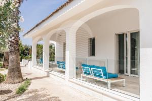 A balcony or terrace at Villa Sabbia Bianca By Cala Salento