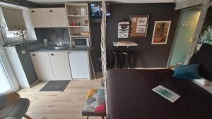 Kuchyň nebo kuchyňský kout v ubytování "En Aqualye" chambre privative chez l'habitant