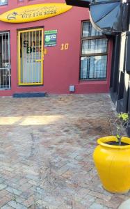 Afbeelding uit fotogalerij van Sunset beach backpackers in Bloubergstrand