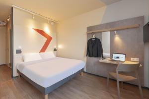 Posteľ alebo postele v izbe v ubytovaní Ibis Budget Mont De Marsan