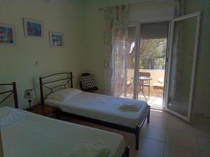A bed or beds in a room at Irina Haus