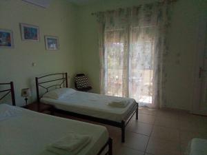 A bed or beds in a room at Irina Haus