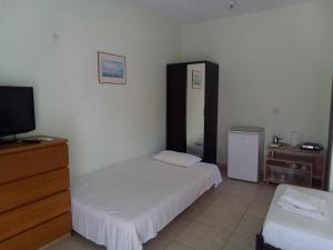 A bed or beds in a room at Irina Haus