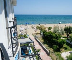 a view of a beach from a balcony of a building at NOVA PORT Boutique Hotel in Tekirdag