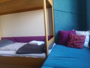 Posteľ alebo postele v izbe v ubytovaní Apartamenty Tatrzańskie Turnie Krupówki