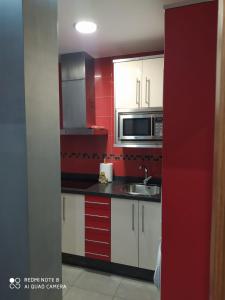 Kuchyň nebo kuchyňský kout v ubytování Apartamento NERPIO