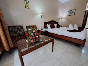 Hotel Preethi Classic Towers客房内的一张或多张床位