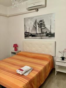 Postel nebo postele na pokoji v ubytování Apartment Versilia