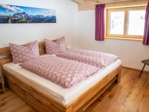Posteľ alebo postele v izbe v ubytovaní Ferienwohnung Schwendle Egg