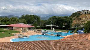 a large swimming pool in a resort at Apartamento Comarca de Haro in Haro