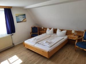 Postel nebo postele na pokoji v ubytování Historik Hotel Ochsen