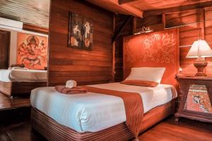 Ein Bett oder Betten in einem Zimmer der Unterkunft Leeloo Paradise