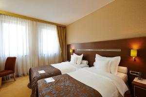 Lova arba lovos apgyvendinimo įstaigoje IN Hotel Beograd