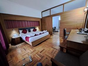Postel nebo postele na pokoji v ubytování Hotel Preethi Classic Towers + 37 fotografií