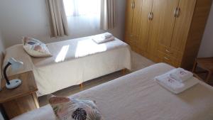 En eller flere senge i et værelse på Aparts Complejo Ricanor + 48 billeder