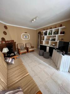 A seating area at Chalet en La Barrosa, Piscina+BBQ+Grifo de Cerveza