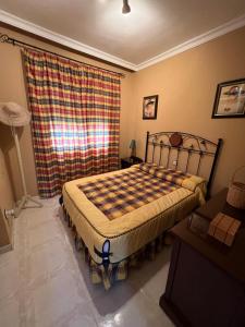A bed or beds in a room at Chalet en La Barrosa, Piscina+BBQ+Grifo de Cerveza