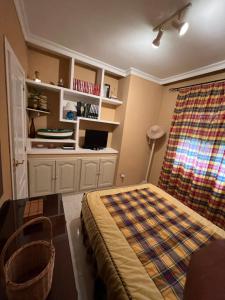 A kitchen or kitchenette at Chalet en La Barrosa, Piscina+BBQ+Grifo de Cerveza